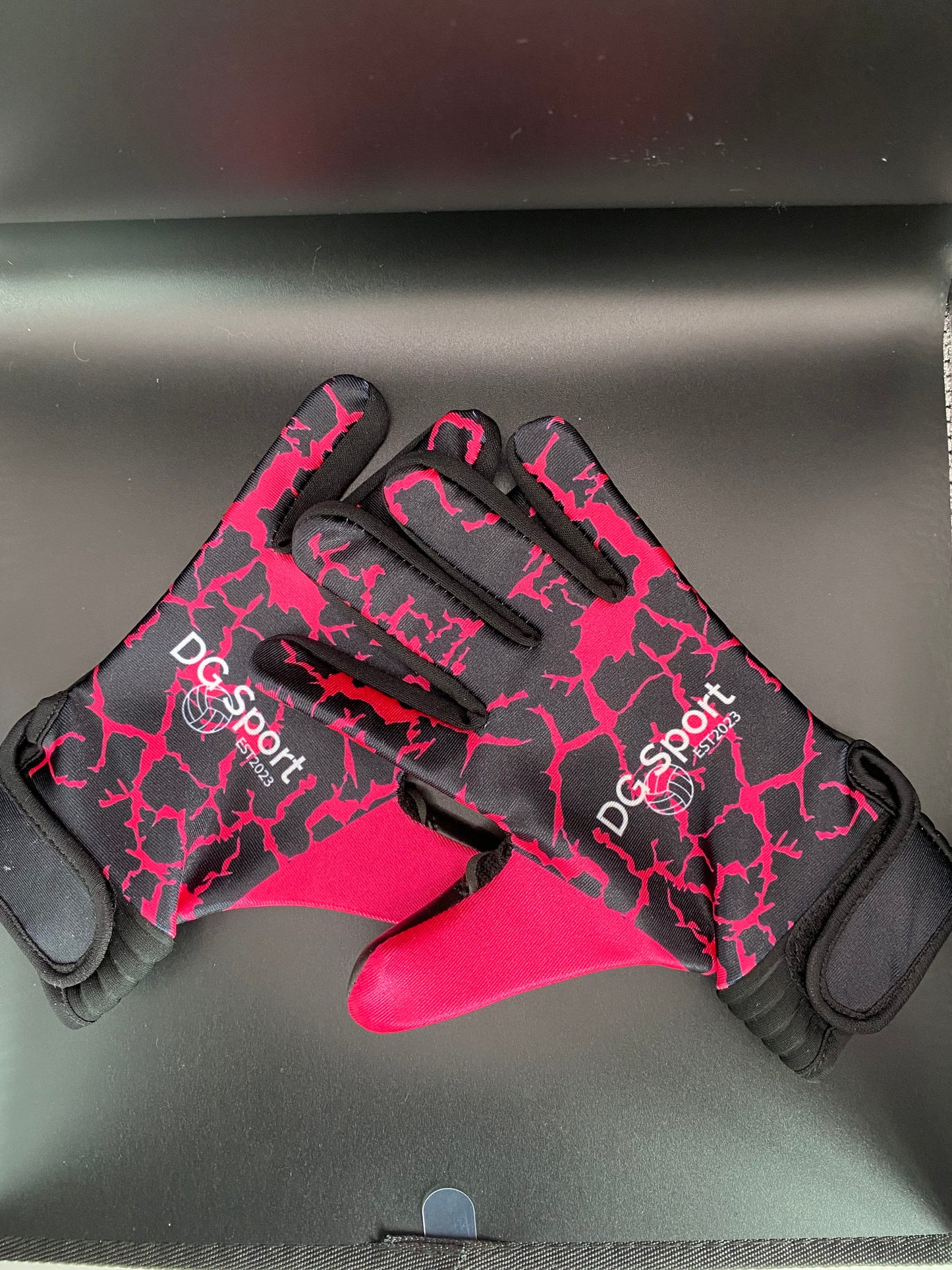 Black and pink lightning gloves