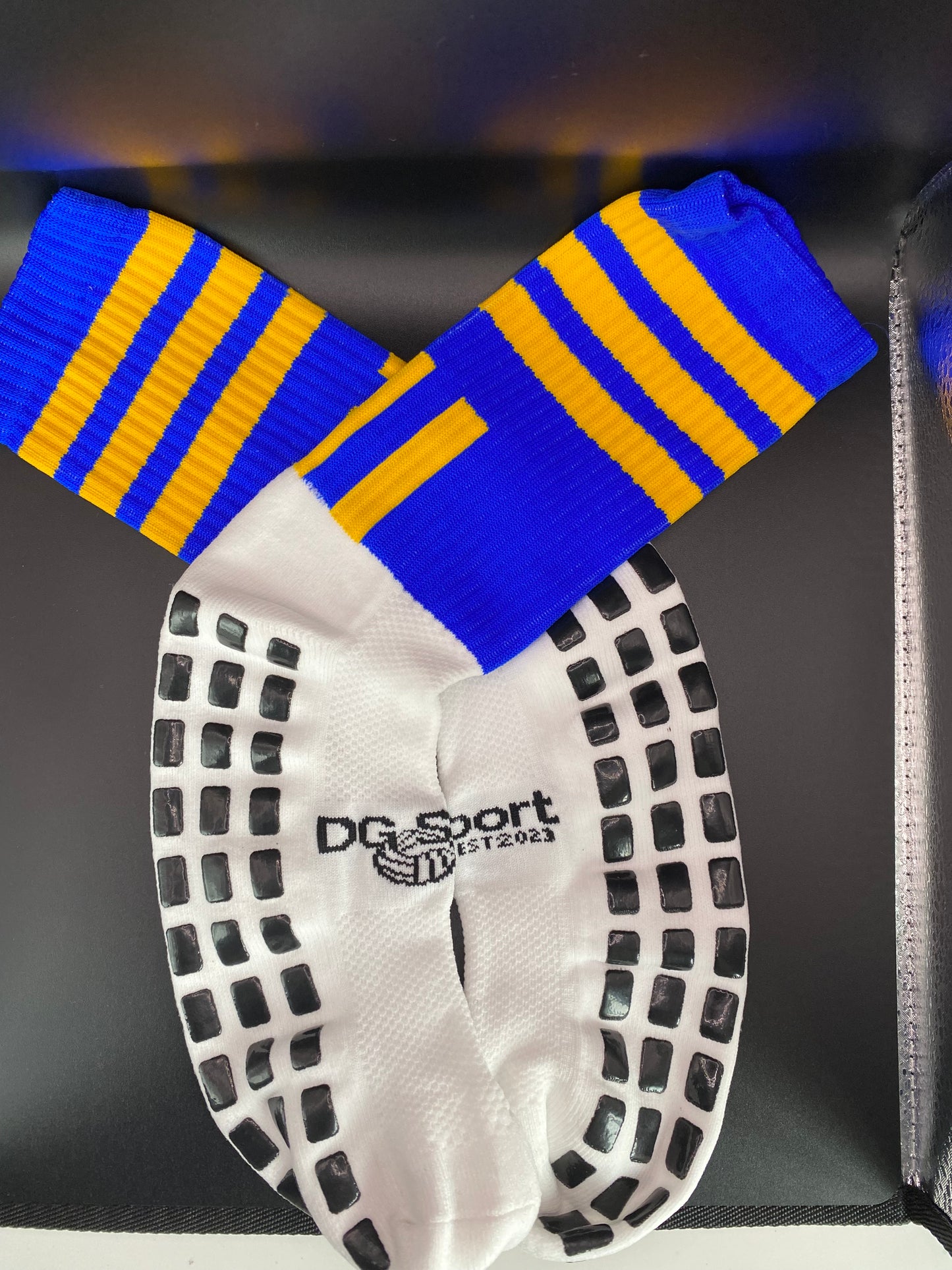 Blue and yellow grip socks