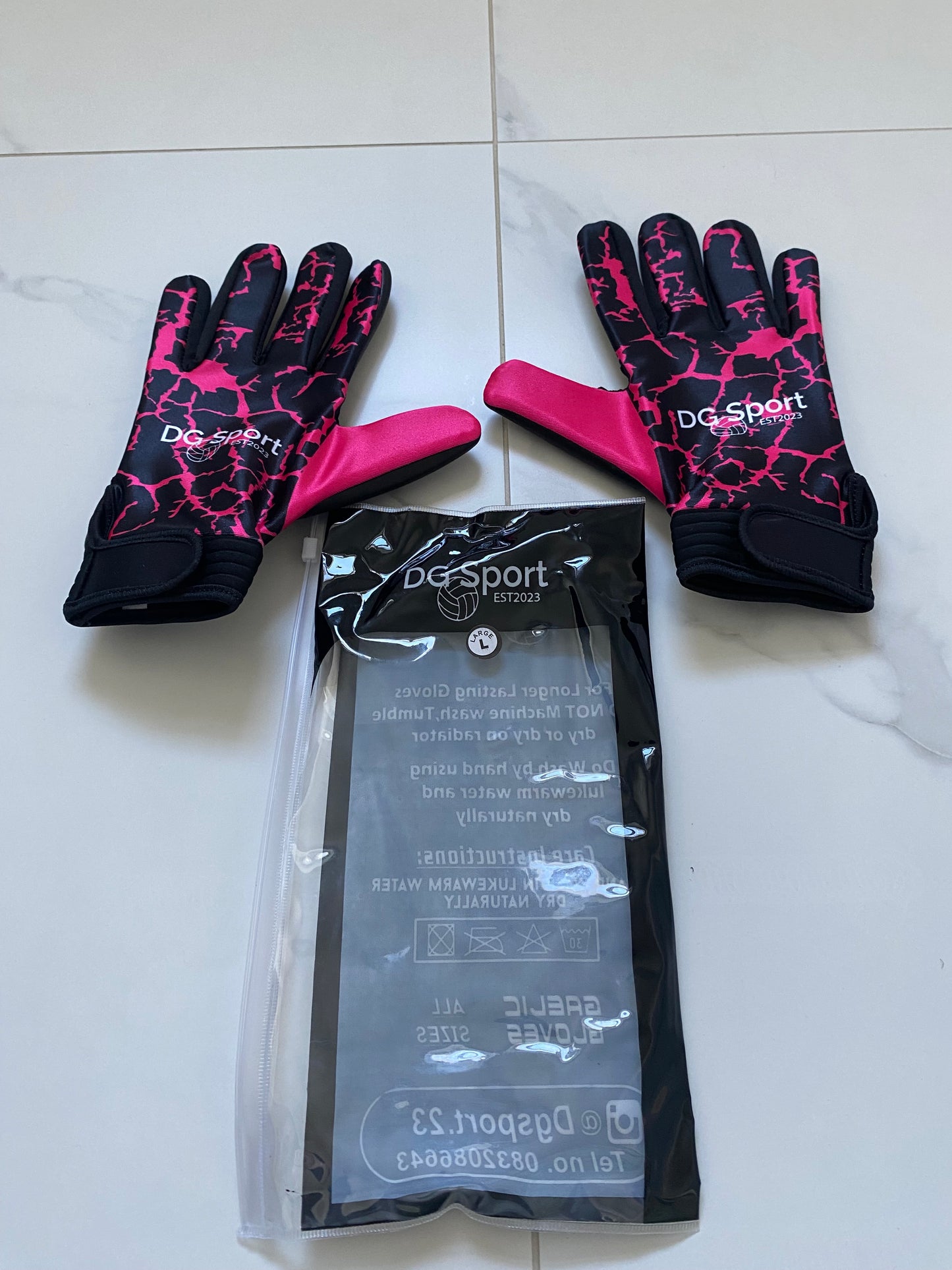 Black and pink lightning gloves