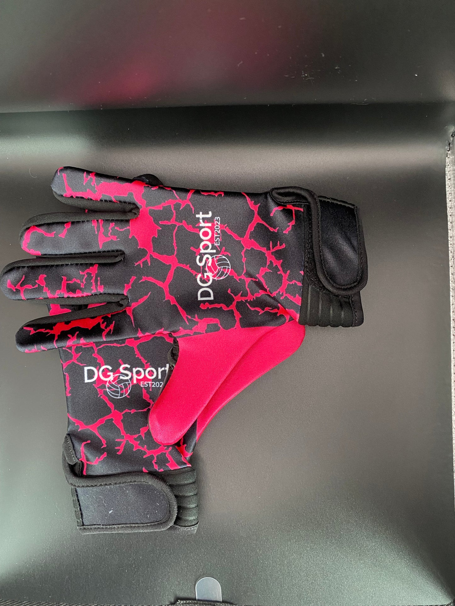 Black and pink lightning gloves